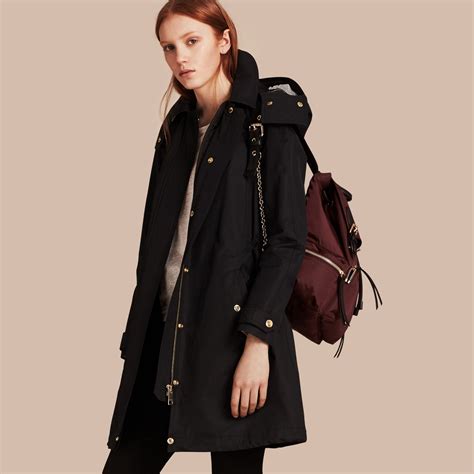 burberry hooded cotton blend parka with detachable warmer|Burberry leather coat.